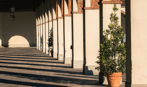 Sunlit colonnade in Piamonte, Italy morning scene