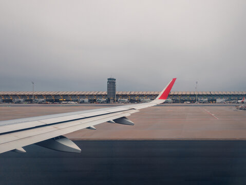 Airplane wing view at tenerife airport in winter
