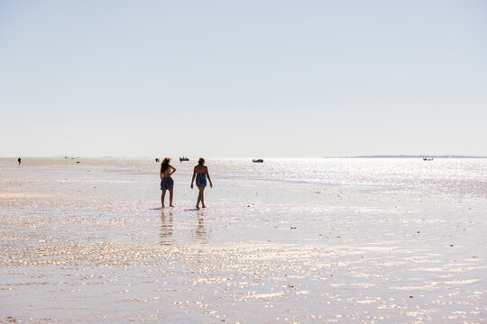 family walking beach, Vilankulos, Mozambique, Africa