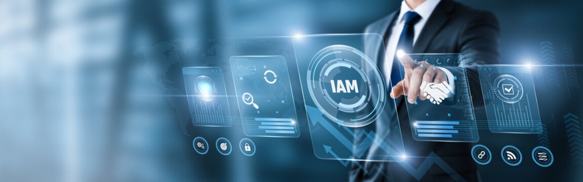 Businessman pointing at digital screen with IAM data and analytics interface. user authentication, access control, cybersecurity, secure login, identity protection, IT security management