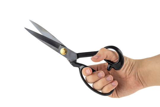 Close-up of hand holding scissors at angle isolated on white background. Perfect for design, editing, and crafting concepts. PNG transparent version included.