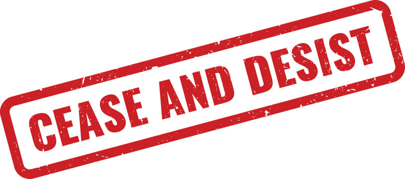 A red grunge rubber stamp with the text cease and desist on a rectangular frame