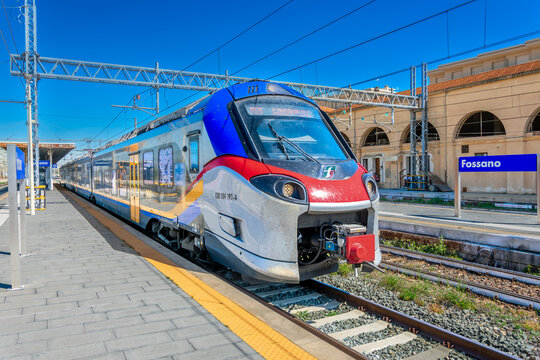 Fossano, Italy &ndash; April 7, 2026: An Alstom Pop electric regional train, model ETR 104, stopped at Fossano Station in Piedmont, Italy, on the Turin&ndash;Savona line