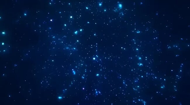 Beautiful and ethereal deep blue space scene with twinkling scattered stars