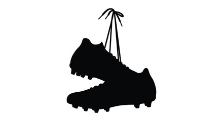 A black soccer cleat with untied laces is shown in dark silhouette © Mithon