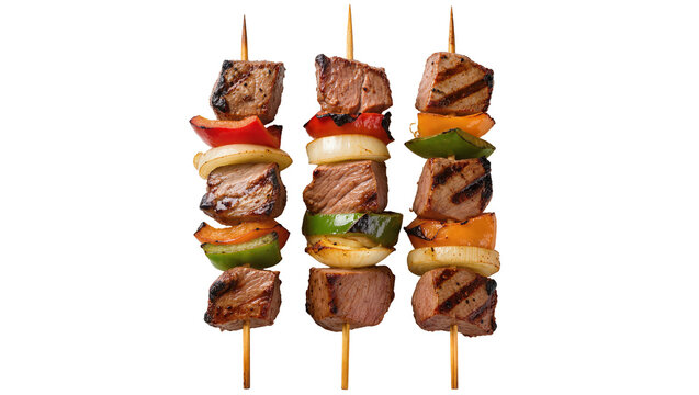 Three grilled beef skewers with bell peppers and onions, isolated on transparent background