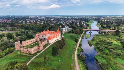 Naklejka premium Drone view of Bauska Castle ruins and historical palace in Latvia