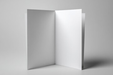 Naklejka premium Minimalist two-panel bi-fold brochure mockup on a cool gray backdrop
