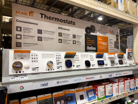 Prosper, Texas, USA - April 1st, 2026: Smart home thermostats from google nest and ecobee showcasing various digital temperature control models in The Home Depot