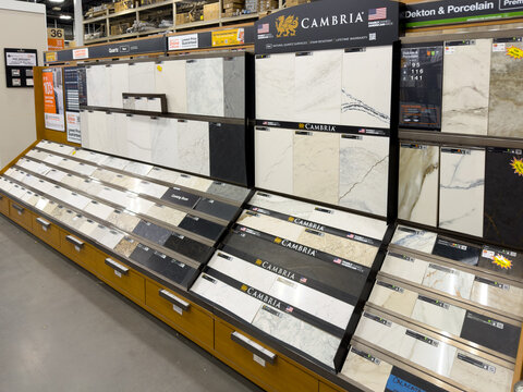 Prosper, Texas, USA - April 8th, 2026: Large display of Cambria quartz and stone countertop tile samples showing various patterns and colors in The Home Depot