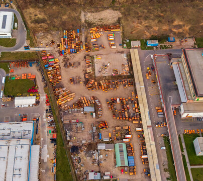 Aerial view of an industrial yard filled with metal and concrete, a mixture of textures under the open sky, Praha, Hlavni mesto Praha, Czechia.