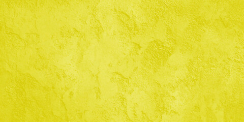 Fototapeta premium A vibrant full frame image showcasing a textured uniformly yellow background with subtle variations in tone and light
