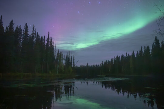 Aurora reflection in a lake in Fairbanks, Alaska