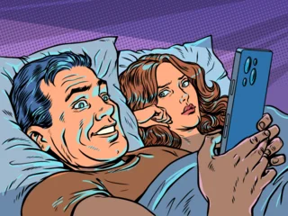 Pop Art Retro A man in bed with his wife looking at his phone. Relationship problems in a married couple. Infidelity and partner addiction. © studiostoks