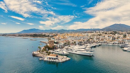 Fototapeta premium Puerto Banús marina aerial view with luxury yachts and waterfront, Marbella, Costa del Sol, Spain