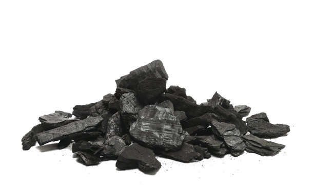 Black charcoal pile isolated on white background, side view, design element