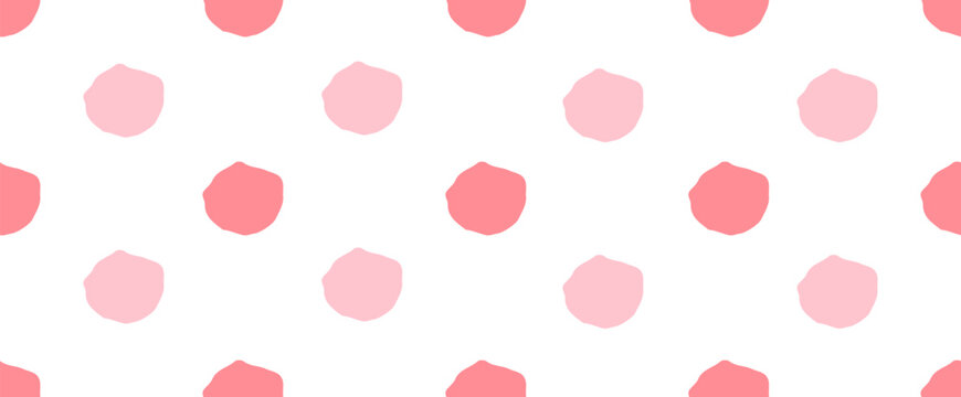 Pink polka dot seamless pattern with soft irregular circles on a white background. Minimal pastel design with a playful hand-drawn feel.
