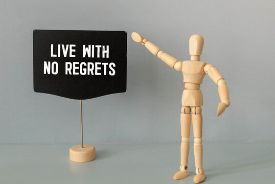 On blue background, torn paper with text written NO REGRET