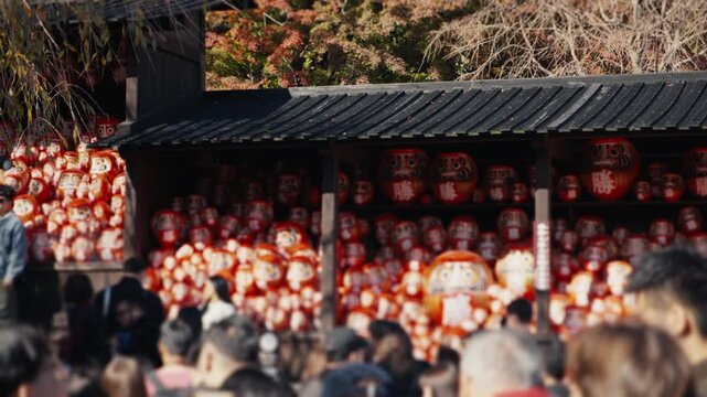 Traditional daruma dolls displayed at katsuoji temple in japan