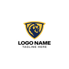 Naklejka premium Roaring Lion Head in Shield Mascot Vector Logo Design