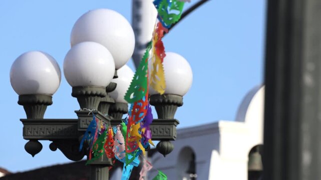 Colorful Flags Wave With Old Fashioned Lamp