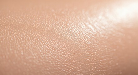 Fototapeta premium Close-up of smooth, healthy human skin with natural texture and subtle shine.