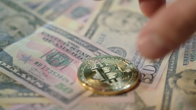 Cryptocurrency, Bitcoin, gold coins, and foreign currency notes together, representing digital and traditional finance investment.

