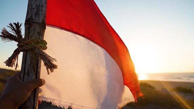 indonesia flag waving in the wind at sunset