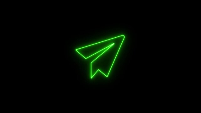 A glowing green diamond shape with sharp edges on a black background