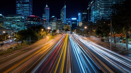 Fototapeta premium Modern City Nightscape: Dynamic Light Trails on Urban Highway