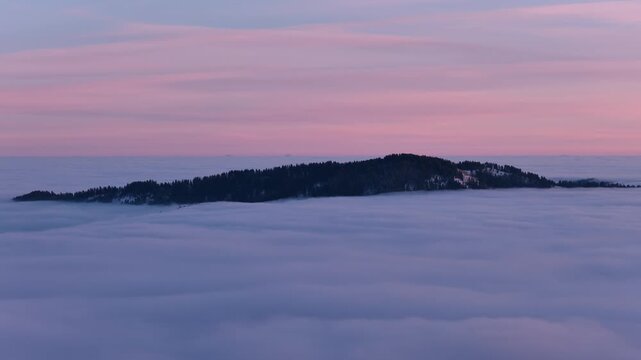 Mountains peaking through the inversion during sunset