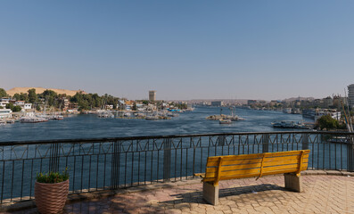 Obraz premium Yellow Bench with Panoramic Nile View in Aswan