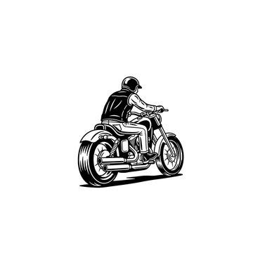 Man Riding A Vintage Motorcycle From Behind.