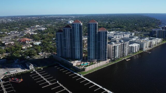 Panoramic view of high-rise condominiums by the waterfront in Fort Myers. Ideal for urban development and real estate projects.