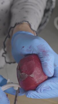 Peeling beet root in a kitchen