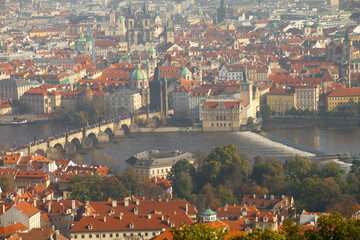 Obraz premium Aerial view of Prague Castle and St. Vitus Cathedral above red roofs, Hradcany, Prague, Czechia. g.