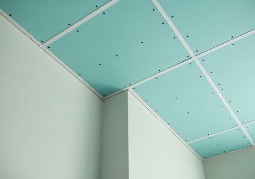 Ceiling under construction with drywall and white trim