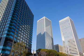 Fototapeta premium Urban skyline of Osaka city with tall business tower buildings
