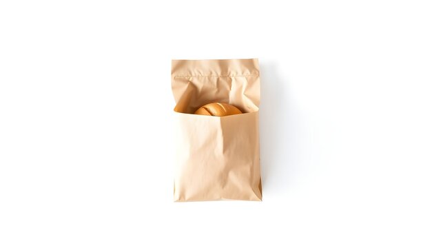 A brown paper bag filled with snacks on a white surface from above