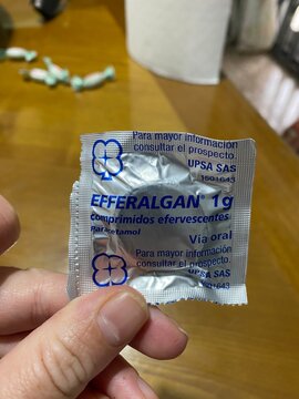 El puerto de santa maria, spain, january 2, 2026 hand holding efferalgan paracetamol blister pack, showing effervescent tablets for pain relief and fever reducing treatment