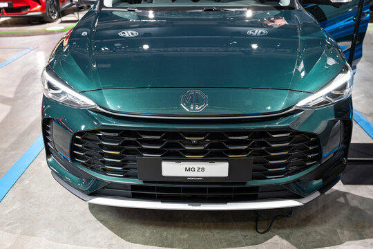 Zurich, Switzerland, October 10, 2025. Emerald Green Metallic MG ZS Hybrid+ SUV on display at the Zurich Auto Show with a close front view