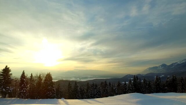 Bold sunset and sky and clods in a winter time, winter landscape.