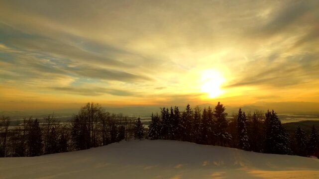 Bold sunset and sky and clods in a winter time, winter landscape.