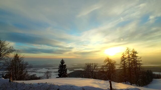 Bold sunset and sky and clods in a winter time, winter landscape.