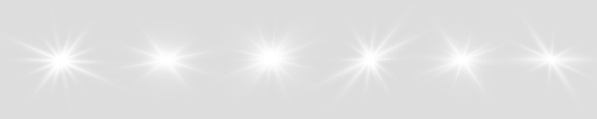 Obraz premium Magic PNG star set flare glows with white radiant beam light. Spark particles drift around soft glowing core gently. Ideal modern festive visuals.