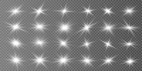 Obraz premium White set star glow radiates soft lens flare beams. Spark particles shimmer gently around bright center core. Ideal for elegant design use.