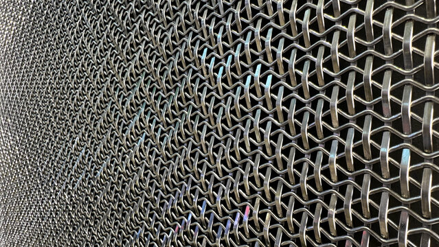 Landscape Photo Perspective View From Right Side of Abstract Architectural Aluminium Stainless Steel Metal Wall Cladding With Crimped Wire Mesh Pattern Art