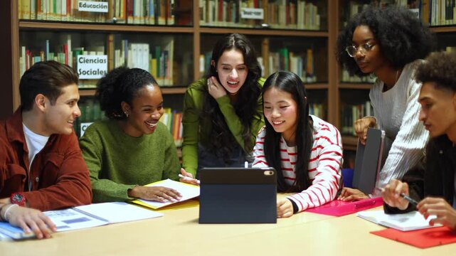 Diverse group of students collaborating in the library
