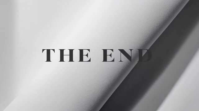 Cinematic 'The End' title card on white folded paper texture
