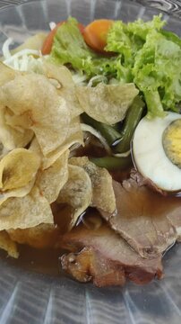 Selat Solo is a dish from Surakarta, Central Java, with European influences. The main ingredient is beef that is braised and served in a sweet, thin Javanese gravy, along with vegetables and potatoes.